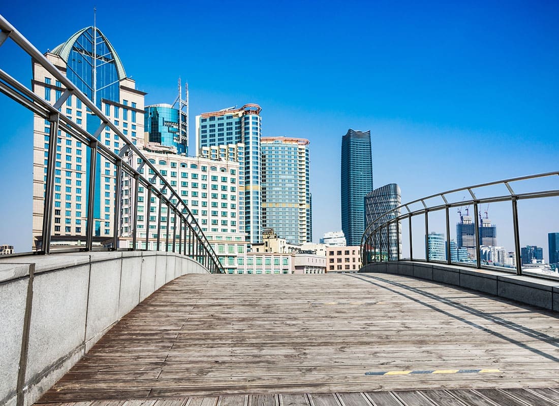 Raleigh, NC - View of Commercial Buildings Against a Bright Blue Sky from a Bridge in Downtown Raleigh North Carolina